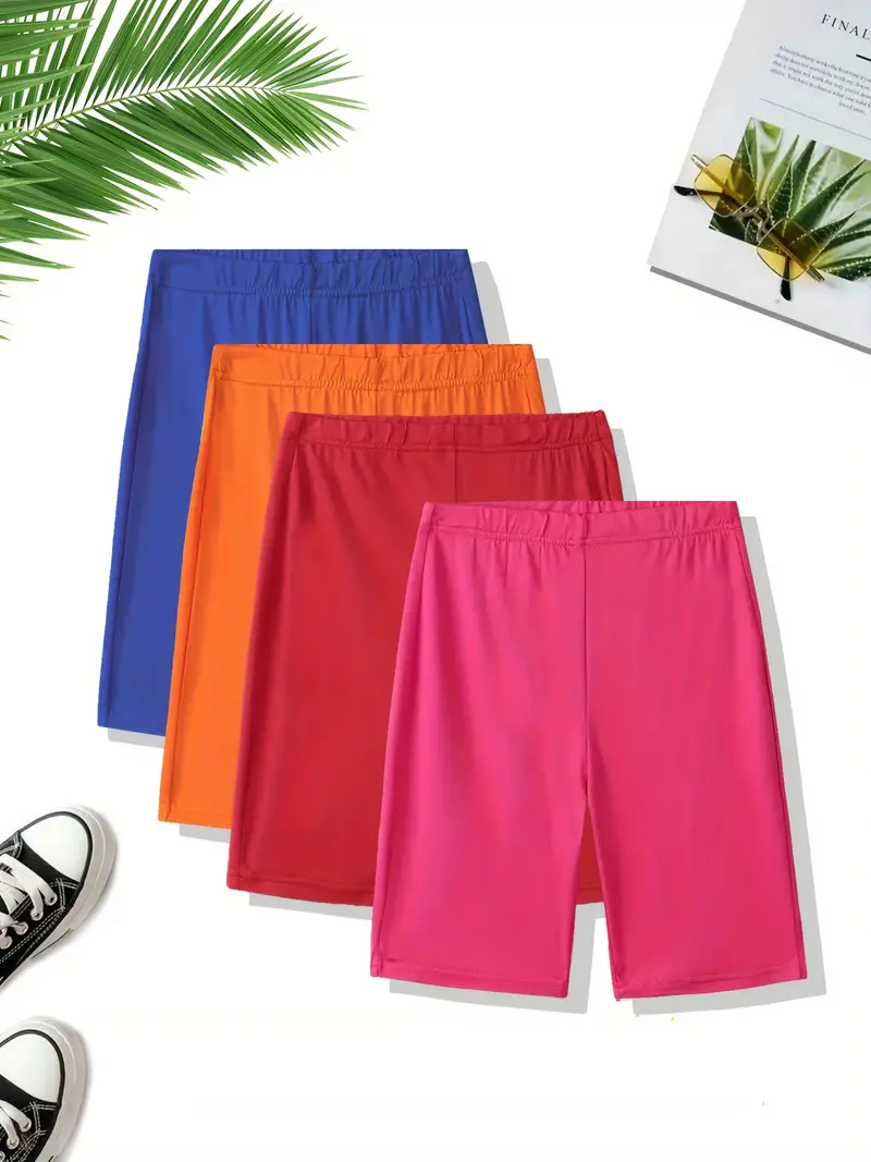 Women's casual athletic shorts in solid colors, featuring breathable, quick-dry fabric and an elastic waistband for a comfortable fit.